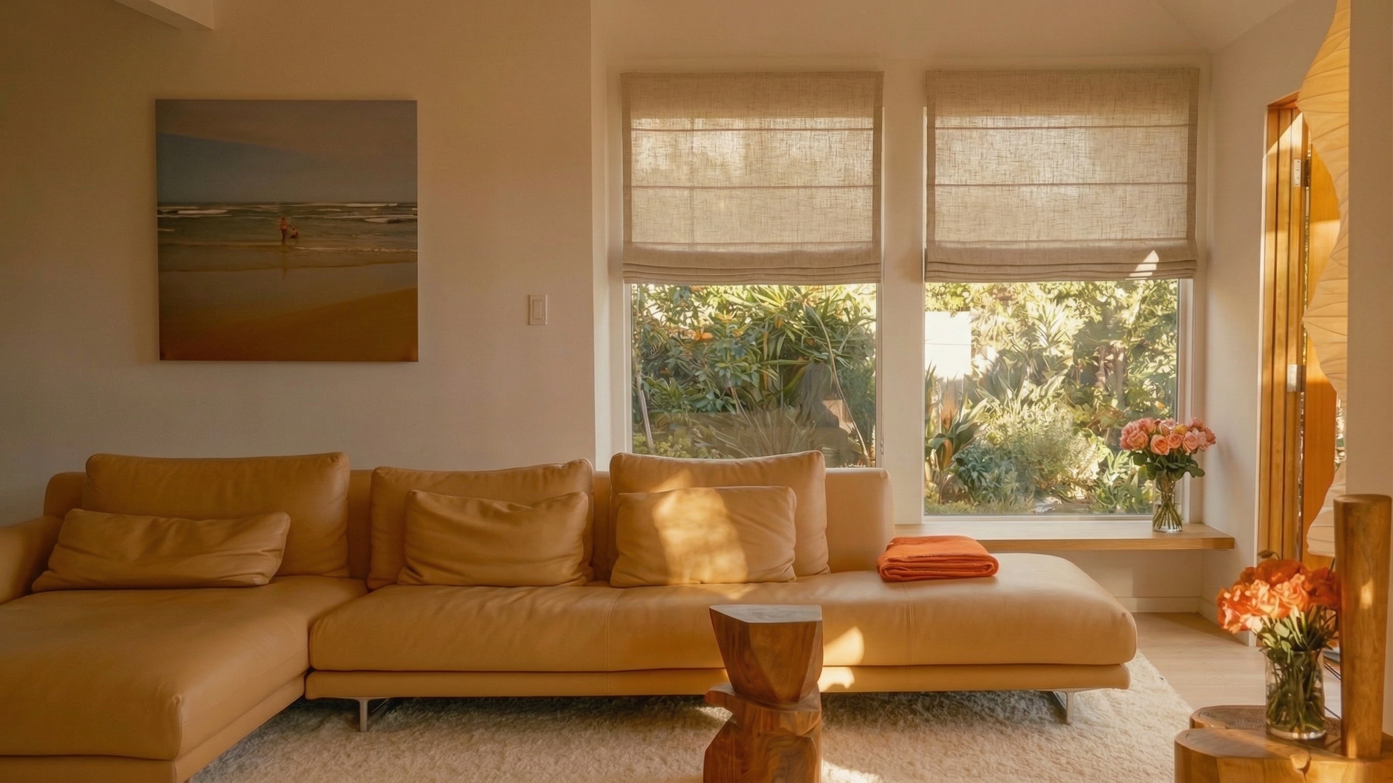 Motorized Roman shade in a styled living space